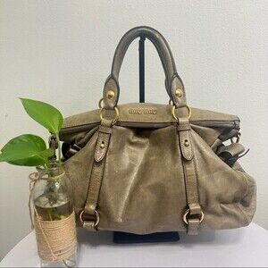 Authentic Miu Miu Vitello Lux Bow Leather Hand Bag in Green